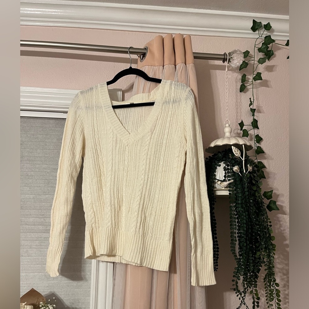 Aeropostale woman’s white sweater.